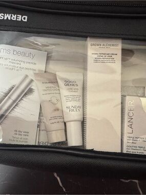 Cosmetic bag with luxury products travel size and some samples